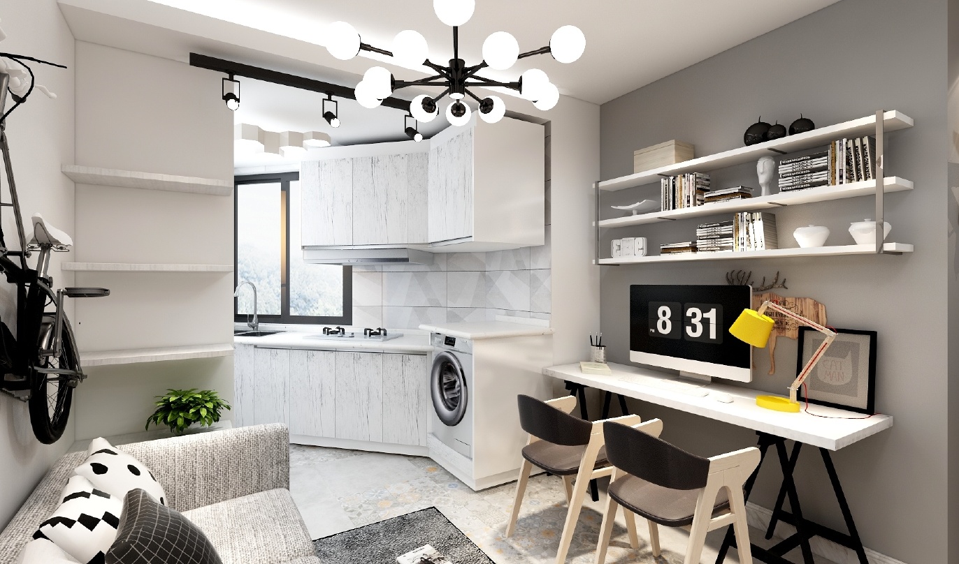 图中是一个极简风格的厨房和客厅一体化空间，厨房有白色和灰色的家电和木色的橱柜，地面上有黑色的台灯和灰色的沙发，墙上挂着装饰画。