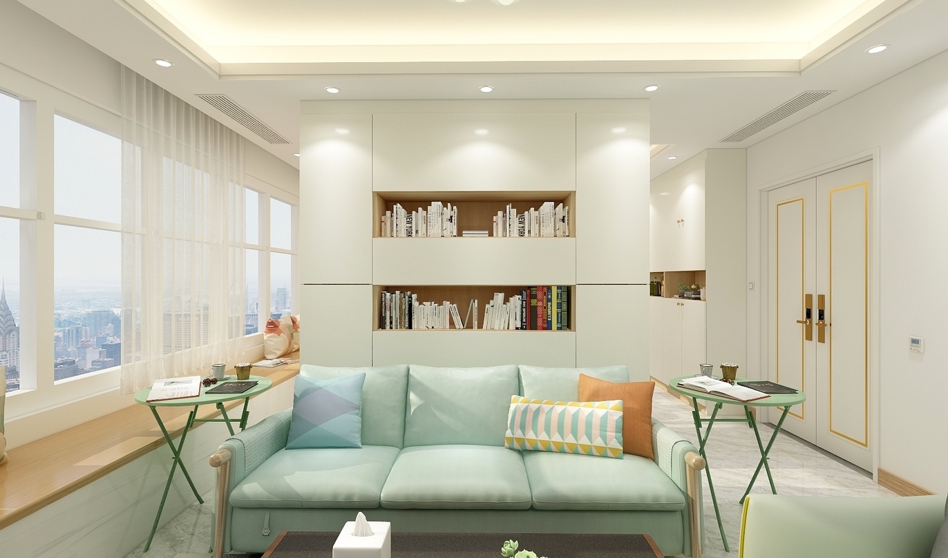 这个客厅空间明亮整洁，以白色和绿色为主色调，给人一种清新、自然的感觉。在沙发墙上，有一个置物架，里面整齐地摆放着各种书籍，显示出主人的阅读习惯和品味。沙发是蓝绿色的，搭配彩色的抱枕，增加了空间的活力。地上的地毯是灰色的，与蓝绿色的沙发形成了色彩对比，让空间更有层次感。茶几是黑色的，上面放着一盒烟和一个白色的烟灰缸，方便使用。墙上还挂着装饰画，增添艺术气息。在沙发的对面，有一扇门通向卧室。窗户明亮，阳光透过窗户洒进来，让整个空间更加明亮舒适。